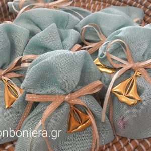 Μπομπονιέρα Βάπτισης πουγκί με ναυτικό σχέδιο και μεταλλική βάρκα.