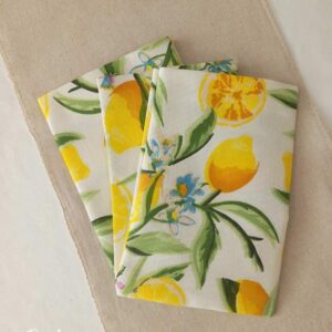 Λευκό λινό πουγκί με σχέδιο λεμόνια για μπομπονιέρα βάπτισης ή γάμου.